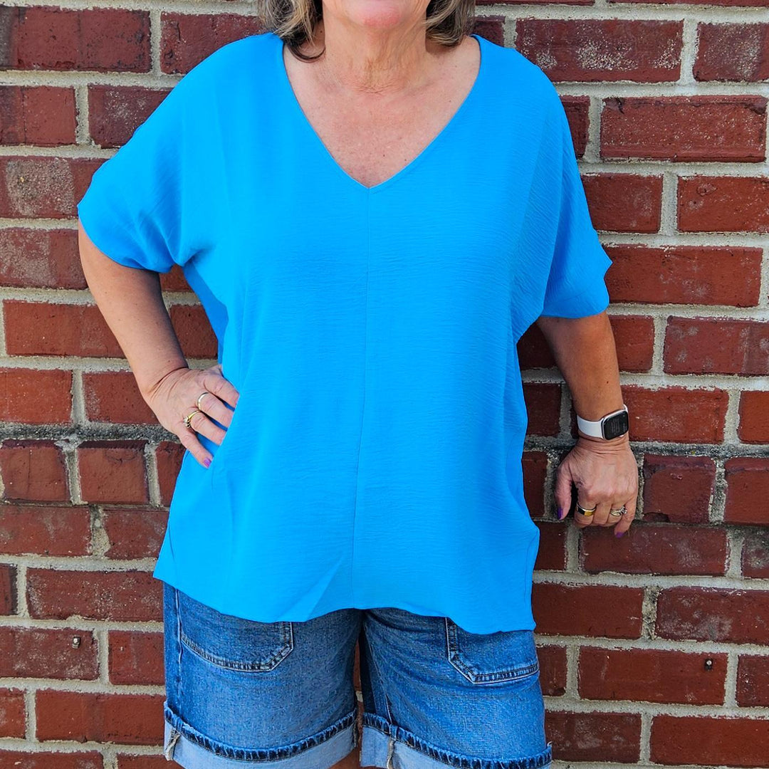 Woven Airflow V-neck Dolman Top